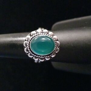 Oval Green Chalcedony Cabachon Ring in Floral Setting